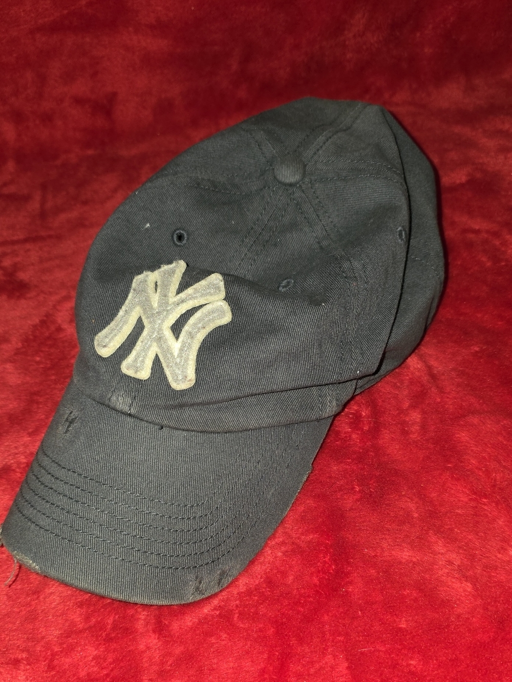 Genuine Merchandise Black Baseball Cap with Tan Embroidered NY Logo